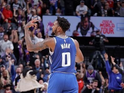 SACRAMENTO, CA - DECEMBER 2: Malik Monk #0 of the Sacramento Kings celebrates a three point basket during the game against the Denver Nuggets on December 2, 2023 at Golden 1 Center in Sacramento, California. NOTE TO USER: User expressly acknowledges and agrees that, by downloading and or using this Photograph, user is consenting to the terms and conditions of the Getty Images License Agreement. Mandatory Copyright Notice: Copyright 2023 NBAE (Photo by Rocky Widner/NBAE via Getty Images)