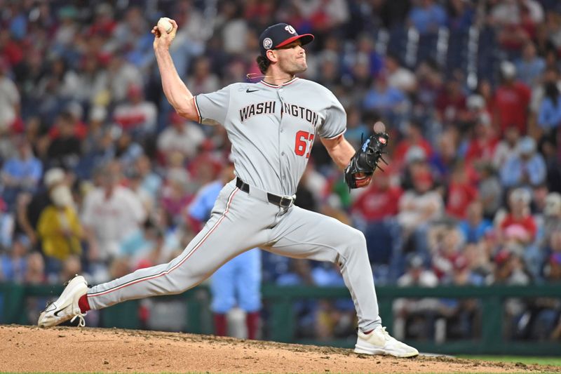 May 1, 2025; Philadelphia, Pennsylvania, USA; Washington Nationals pitcher Kyle Finnegan (67) throws a pitch during the ninth inning against the Philadelphia Phillies at Citizens Bank Park. Mandatory Credit: Eric Hartline-Imagn Images