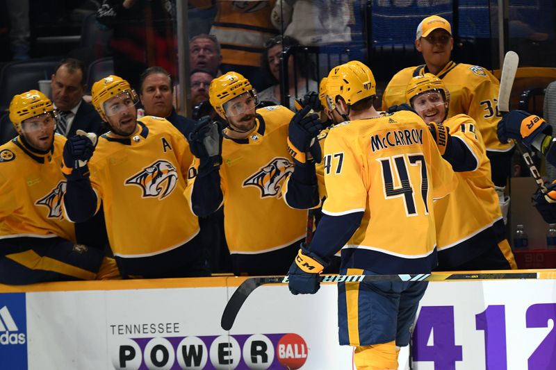 Feb 27, 2024; Nashville, Tennessee, USA; Nashville Predators right wing Michael McCarron (47) is congratulated by teammates after a goal during the first period against the Ottawa Senators at Bridgestone Arena. Mandatory Credit: Christopher Hanewinckel-USA TODAY Sports