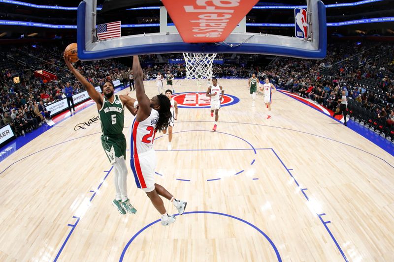 DETROIT, MI - JANUARY 22:  Malik Beasley #5 of the Milwaukee Bucks drives to the basket during the game against the Detroit Pistons on January 22, 2024 at Little Caesars Arena in Detroit, Michigan. NOTE TO USER: User expressly acknowledges and agrees that, by downloading and/or using this photograph, User is consenting to the terms and conditions of the Getty Images License Agreement. Mandatory Copyright Notice: Copyright 2024 NBAE (Photo by Brian Sevald/NBAE via Getty Images)