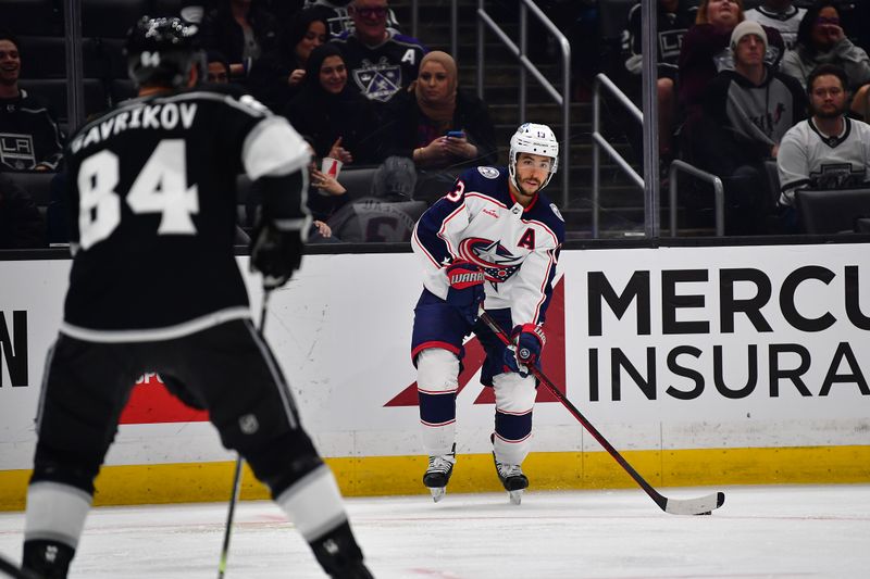 Mar 16, 2023; Los Angeles, California, USA; Columbus Blue Jackets left wing Johnny Gaudreau (13) controls the puck against the Los Angeles Kings during the third period at Crypto.com Arena. Mandatory Credit: Gary A. Vasquez-USA TODAY Sports