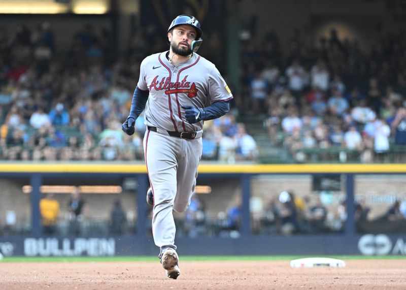 Jul 31, 2024; Milwaukee, Wisconsin, USA; Atlanta Braves catcher Travis d'Arnaud (16) rounds the bases after hitting a home run against the Milwaukee Brewers in the seventh inning at American Family Field. Mandatory Credit: Michael McLoone-USA TODAY Sports