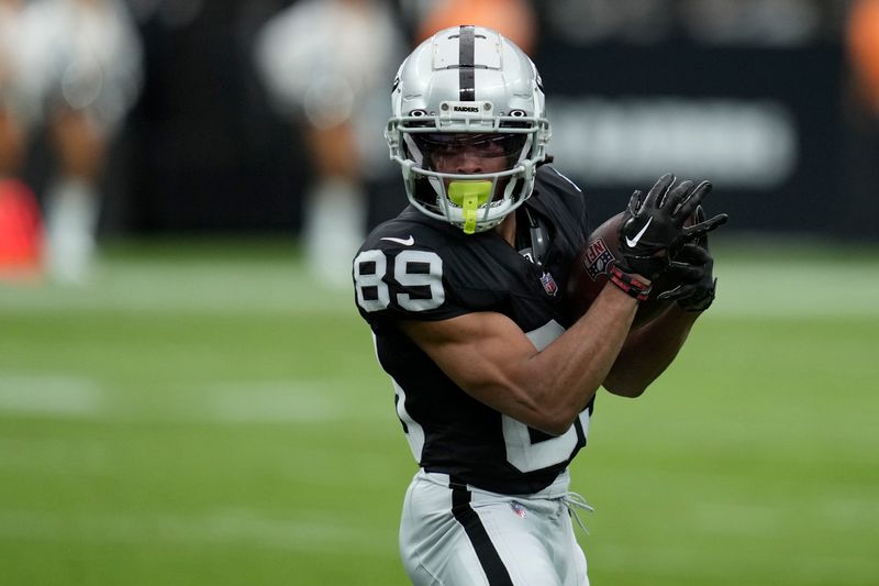 Las Vegas Raiders wide receiver Tre Tucker (89) plays against the San Francisco 49ers during an NFL football game Sunday, Aug. 13, 2023, in Las Vegas. (AP Photo/John Locher)