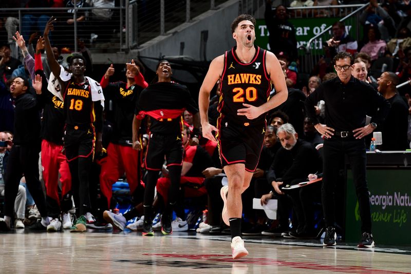 ATLANTA, GA - MARCH 6:  Georges Niang #20 of the Atlanta Hawks celebrates during the game against the Indiana Pacers on March 6, 2025 at State Farm Arena in Atlanta, Georgia.  NOTE TO USER: User expressly acknowledges and agrees that, by downloading and/or using this Photograph, user is consenting to the terms and conditions of the Getty Images License Agreement. Mandatory Copyright Notice: Copyright 2025 NBAE (Photo by Scott Cunningham/NBAE via Getty Images)