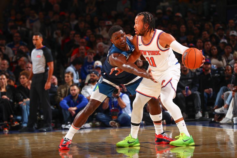 NEW YORK, NY - OCTOBER 13: Jalen Brunson #11 of the New York Knicks is defended by Anthony Edwards #5 of the Minnesota Timberwolves on October 13, 2024 at Madison Square Garden in New York City, New York.  NOTE TO USER: User expressly acknowledges and agrees that, by downloading and or using this photograph, User is consenting to the terms and conditions of the Getty Images License Agreement. Mandatory Copyright Notice: Copyright 2024 NBAE  (Photo by David L. Nemec/NBAE via Getty Images)