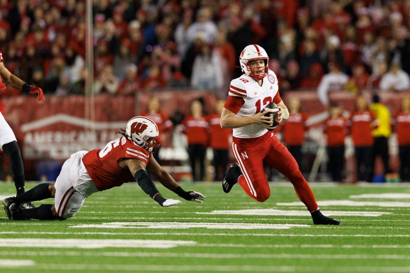 Nov 18, 2023; Madison, Wisconsin, USA;  Nebraska Cornhuskers quarterback Chubba Purdy (12) rushes with the football during the second quarter against the Wisconsin Badgers at Camp Randall Stadium. Mandatory Credit: Jeff Hanisch-USA TODAY Sports