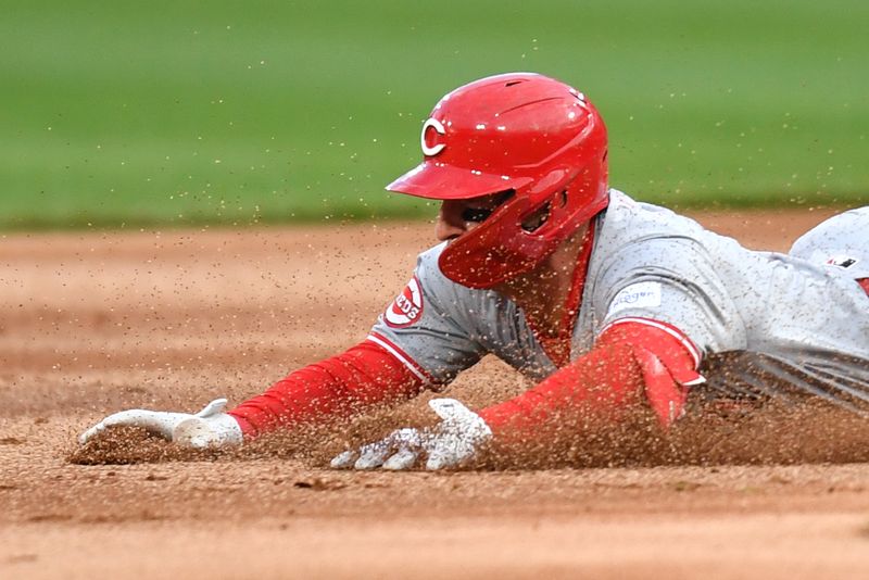 Apr 12, 2024; Chicago, Illinois, USA; Cincinnati Reds left fielder Spencer Steer (7) slides into second base after hitting a double during the first inning against the Chicago White Sox at Guaranteed Rate Field. Mandatory Credit: Patrick Gorski-USA TODAY Sports