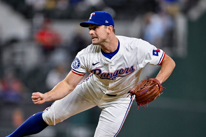 Sep 5, 2024; Arlington, Texas, USA; Texas Rangers relief pitcher David Robertson (37) pitches against the Los Angeles Angels during the game at Globe Life Field. Mandatory Credit: Jerome Miron-Imagn Images