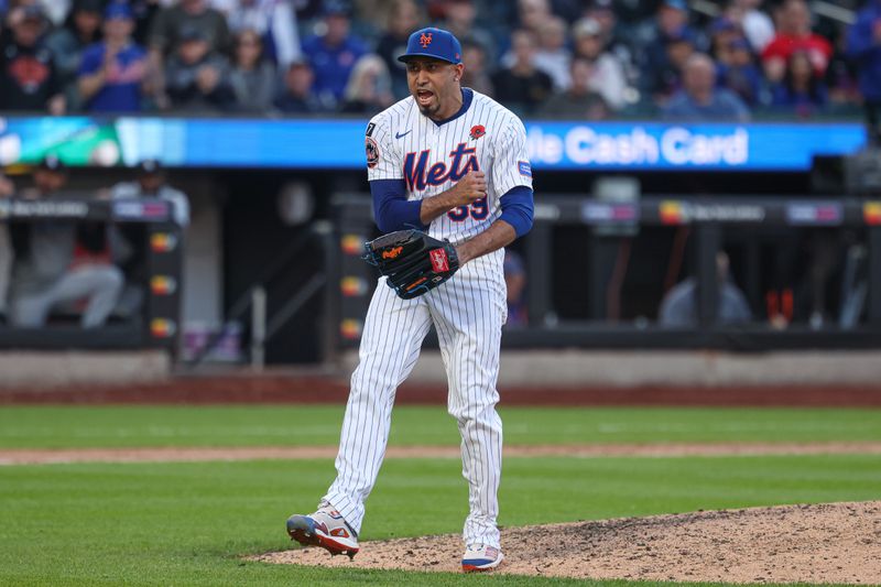 May 26, 2025; New York City, New York, USA; New York Mets relief pitcher Edwin Diaz (39) reacts after recording a strike out to end the top of the ninth inning against the Chicago White Sox at Citi Field. Mandatory Credit: Vincent Carchietta-Imagn Images