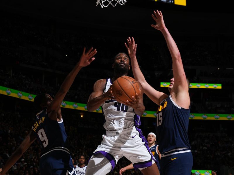 DENVER, CO - FEBRUARY 14: Harrison Barnes #40 of the Sacramento Kings drives to the basket during the game against the Denver Nuggets on February 14, 2024 at the Ball Arena in Denver, Colorado. NOTE TO USER: User expressly acknowledges and agrees that, by downloading and/or using this Photograph, user is consenting to the terms and conditions of the Getty Images License Agreement. Mandatory Copyright Notice: Copyright 2024 NBAE (Photo by Garrett Ellwood/NBAE via Getty Images)