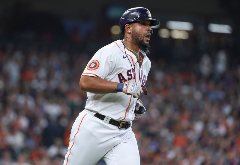 Jul 4, 2023; Houston, Texas, USA; Houston Astros first baseman Jose Abreu (79) runs to first base on a single during the second inning against the Colorado Rockies at Minute Maid Park. Mandatory Credit: Troy Taormina-USA TODAY Sports