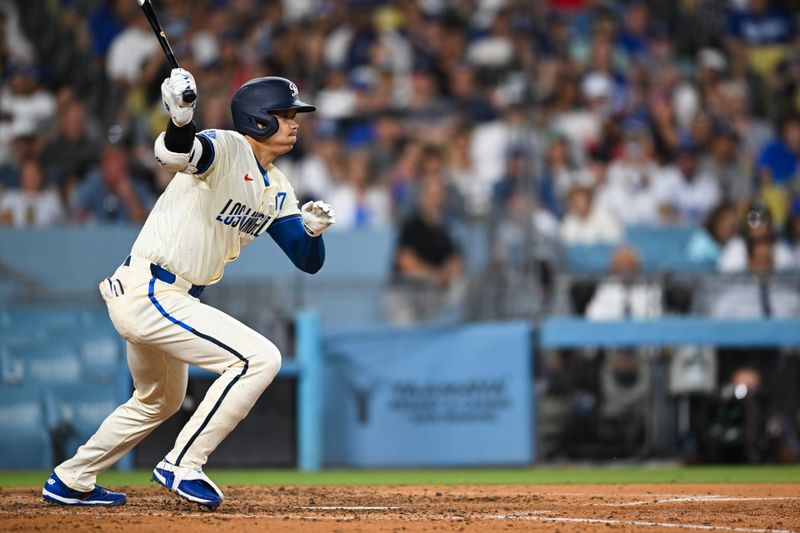 Jun 22, 2024; Los Angeles, California, USA; Los Angeles Dodgers designated hitter Shohei Ohtani (17) forced out a first base against the Los Angeles Angels during the sixth inning at Dodger Stadium. Mandatory Credit: Jonathan Hui-USA TODAY Sports