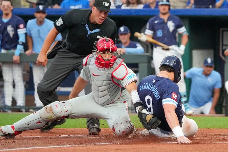 Aug 23, 2024; Kansas City, Missouri, USA; Philadelphia Phillies catcher J.T. Realmuto (10) is late to the tag as Kansas City Royals first baseman Vinnie Pasquantino (9) scores in the first inning at Kauffman Stadium. Mandatory Credit: Denny Medley-USA TODAY Sports