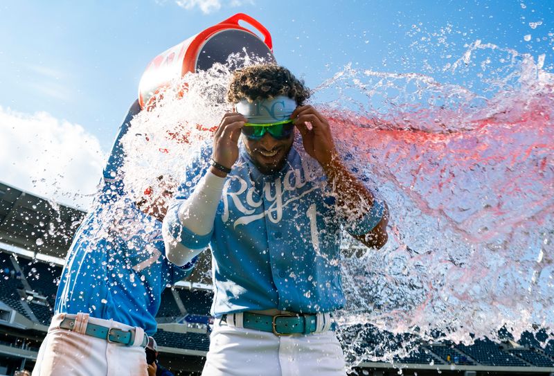 Sep 20, 2023; Kansas City, Missouri, USA; Kansas City Royals designated hitter MJ Melendez (1) is splashed with water by shortstop Bobby Witt Jr. (7) after a game against the Cleveland Guardians at Kauffman Stadium. Mandatory Credit: Jay Biggerstaff-USA TODAY Sports