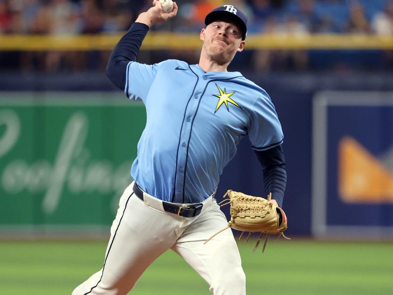 Jul 14, 2024; St. Petersburg, Florida, USA;  Tampa Bay Rays pitcher Pete Fairbanks (29) throws a pitch against the Cleveland Guardians during the ninth inning at Tropicana Field. Mandatory Credit: Kim Klement Neitzel-USA TODAY Sports