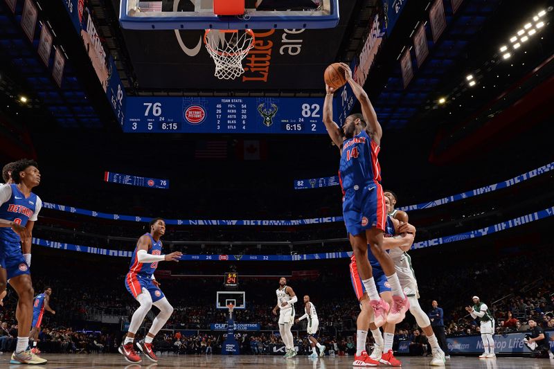 DETROIT, MI - JANUARY 20: Alec Burks #14 of the Detroit Pistons rebounds during the game against the Milwaukee Bucks on January 20, 2024 at Little Caesars Arena in Detroit, Michigan. NOTE TO USER: User expressly acknowledges and agrees that, by downloading and/or using this photograph, User is consenting to the terms and conditions of the Getty Images License Agreement. Mandatory Copyright Notice: Copyright 2024 NBAE (Photo by Chris Schwegler/NBAE via Getty Images)