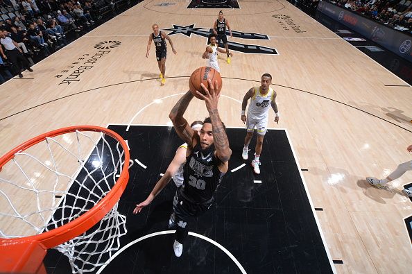 SAN ANTONIO, TX - DECEMBER 26: Julian Champagnie #30 of the San Antonio Spurs drives to the basket during the game against the Utah Jazz on December 26, 2023 at the Frost Bank Center in San Antonio, Texas. NOTE TO USER: User expressly acknowledges and agrees that, by downloading and or using this photograph, user is consenting to the terms and conditions of the Getty Images License Agreement. Mandatory Copyright Notice: Copyright 2023 NBAE (Photos by Michael Gonzales/NBAE via Getty Images)