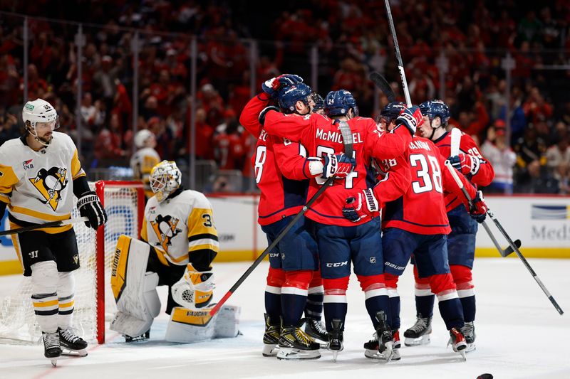 Apr 4, 2024; Washington, District of Columbia, USA; Washington Capitals left wing Alex Ovechkin (8) celebrates with teammates after scoring a goal against the Pittsburgh Penguins in the third period at Capital One Arena. Mandatory Credit: Geoff Burke-USA TODAY Sports