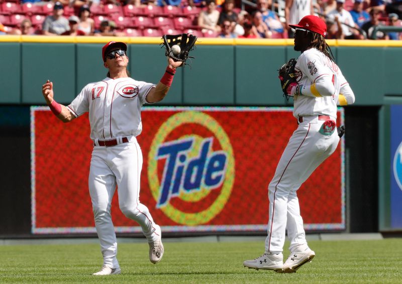 Sep 3, 2023; Cincinnati, Ohio, USA; Cincinnati Reds left fielder Stuart Fairchild (17) fields a fly ball against the Chicago Cubs during the ninth inning at Great American Ball Park. Mandatory Credit: David Kohl-USA TODAY Sports