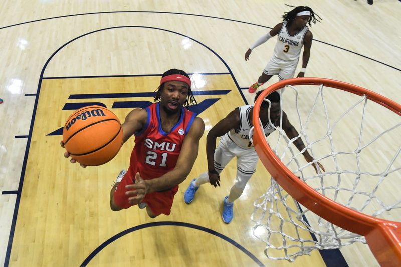 Feb 26, 2025; Berkeley, California, USA; SMU Mustangs forward Yohan Traore (21) attempts a layup against the California Golden Bears in the second half at Haas Pavilion. Mandatory Credit: Eakin Howard-Imagn Images