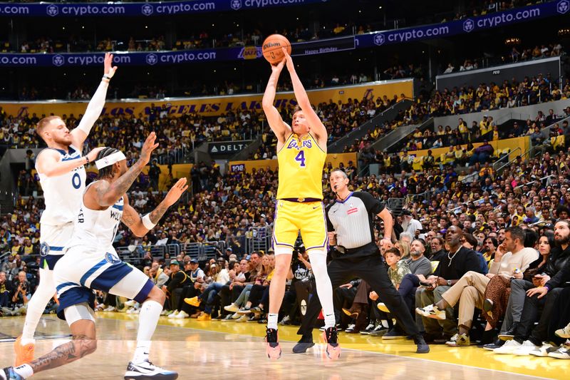 LOS ANGELES, CA - OCTOBER 22: Dalton Knecht #4 of the Los Angeles Lakers shoots the ball during the game against the Minnesota Timberwolves on October 22, 2024 at Crypto.Com Arena in Los Angeles, California. NOTE TO USER: User expressly acknowledges and agrees that, by downloading and/or using this Photograph, user is consenting to the terms and conditions of the Getty Images License Agreement. Mandatory Copyright Notice: Copyright 2024 NBAE (Photo by Adam Pantozzi/NBAE via Getty Images)