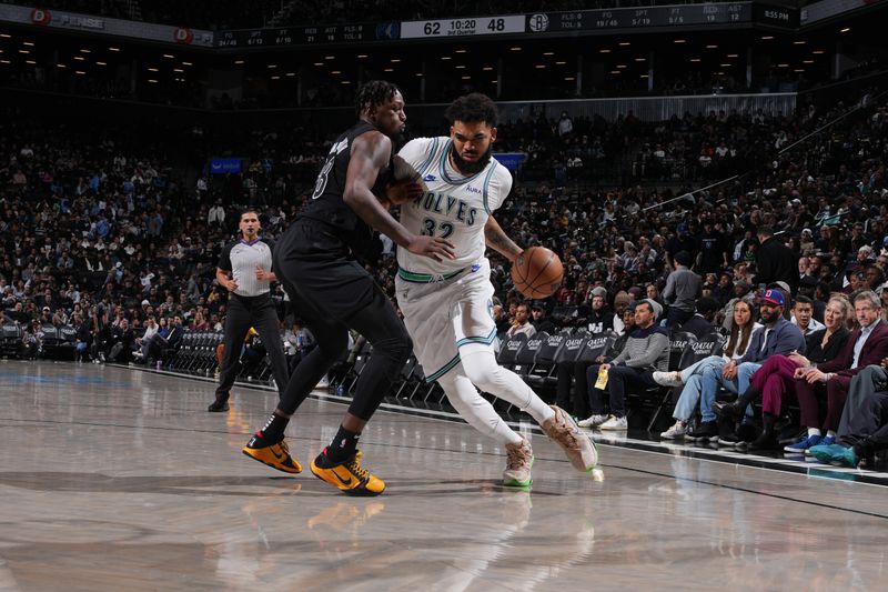 BROOKLYN, NY - JANUARY 25: Karl-Anthony Towns #32 of the Minnesota Timberwolves drives to the basket during the game against the Brooklyn Nets on January 25, 2024 at Barclays Center in Brooklyn, New York. NOTE TO USER: User expressly acknowledges and agrees that, by downloading and or using this Photograph, user is consenting to the terms and conditions of the Getty Images License Agreement. Mandatory Copyright Notice: Copyright 2024 NBAE (Photo by Jesse D. Garrabrant/NBAE via Getty Images)