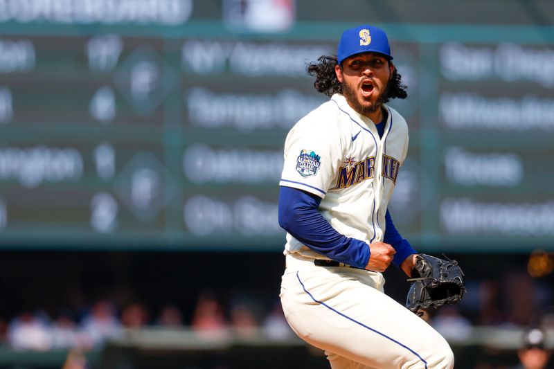 Aug 27, 2023; Seattle, Washington, USA; Seattle Mariners relief pitcher Andres Munoz (75) reacts after getting a strike out to complete a 3-2 victory against the Kansas City Royals at T-Mobile Park. Mandatory Credit: Joe Nicholson-USA TODAY Sports