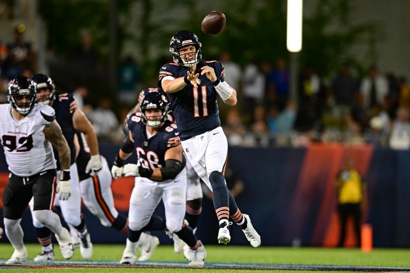 Chicago Bears quarterback Brett Rypien (11) throws a pass during the second half of an NFL exhibition Hall of Fame football game against the Houston Texans, Thursday, Aug. 1, 2024, in Canton, Ohio. (AP Photo/David Dermer)