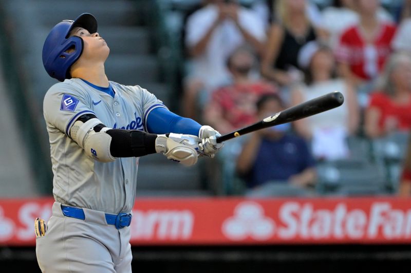 Sep 4, 2024; Anaheim, California, USA;  Los Angeles Dodgers designated hitter Shohei Ohtani (17) flies out in the first inning against the Los Angeles Angels at Angel Stadium. Mandatory Credit: Jayne Kamin-Oncea-Imagn Images