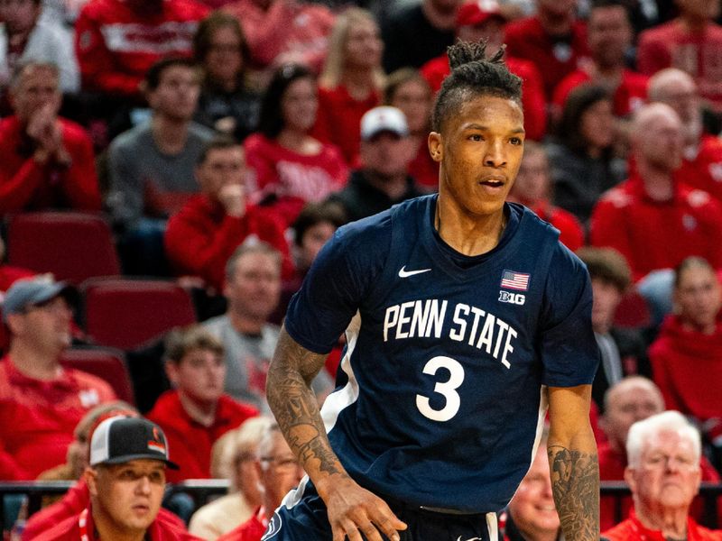 Feb 17, 2024; Lincoln, Nebraska, USA; Penn State Nittany Lions guard Nick Kern Jr. (3) dribbles the ball against the Nebraska Cornhuskers during the second half at Pinnacle Bank Arena. Mandatory Credit: Dylan Widger-USA TODAY Sports