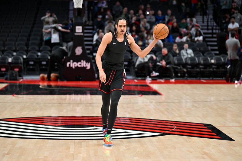 PORTLAND, OREGON - FEBRUARY 10: Dalano Banton #5 of the Portland Trail Blazers warms up before the game against the New Orleans Pelicans at the Moda Center on February 10, 2024 in Portland, Oregon. NOTE TO USER: User expressly acknowledges and agrees that, by downloading and or using this photograph, User is consenting to the terms and conditions of the Getty Images License Agreement. (Photo by Alika Jenner/Getty Images)