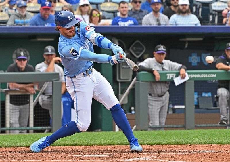 Apr 24, 2025; Kansas City, Missouri, USA;  Kansas City Royals shortstop Bobby Witt Jr. (7) doubles in the sixth inning against the Colorado Rockies at Kauffman Stadium. Mandatory Credit: Peter Aiken-Imagn Images