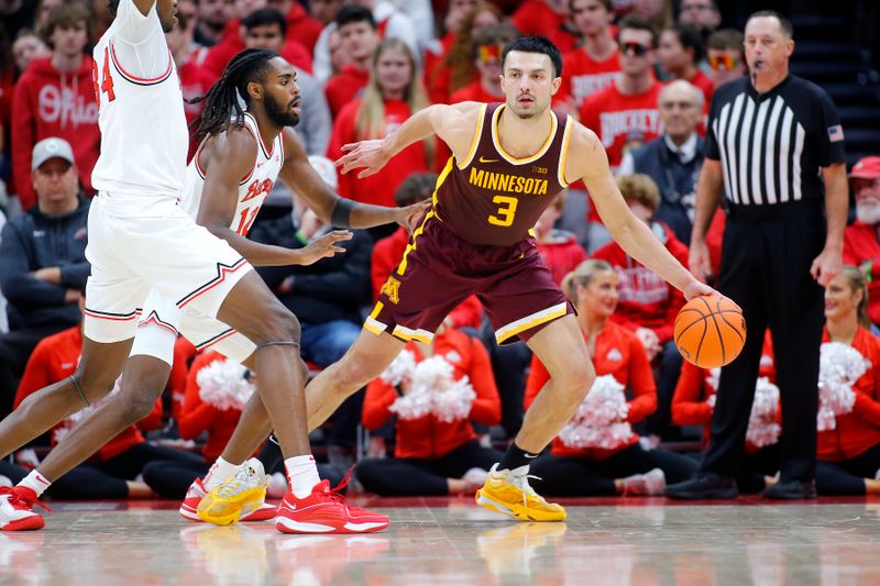 Dec 3, 2023; Columbus, Ohio, USA;  Minnesota Golden Gophers forward Dawson Garcia (3) looks to pass as Ohio State Buckeyes guard Evan Mahaffey (12) defends him on the play during the second half at Value City Arena. Mandatory Credit: Joseph Maiorana-USA TODAY Sports