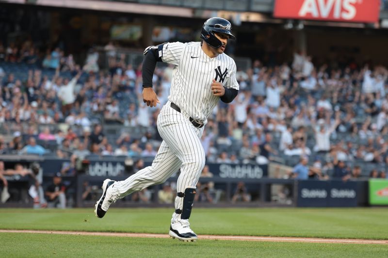 Jun 6, 2024; Bronx, New York, USA; New York Yankees center fielder Trent Grisham (12) runs the bases after hitting a solo home run during the second inning against the Minnesota Twins at Yankee Stadium. Mandatory Credit: Vincent Carchietta-USA TODAY Sports