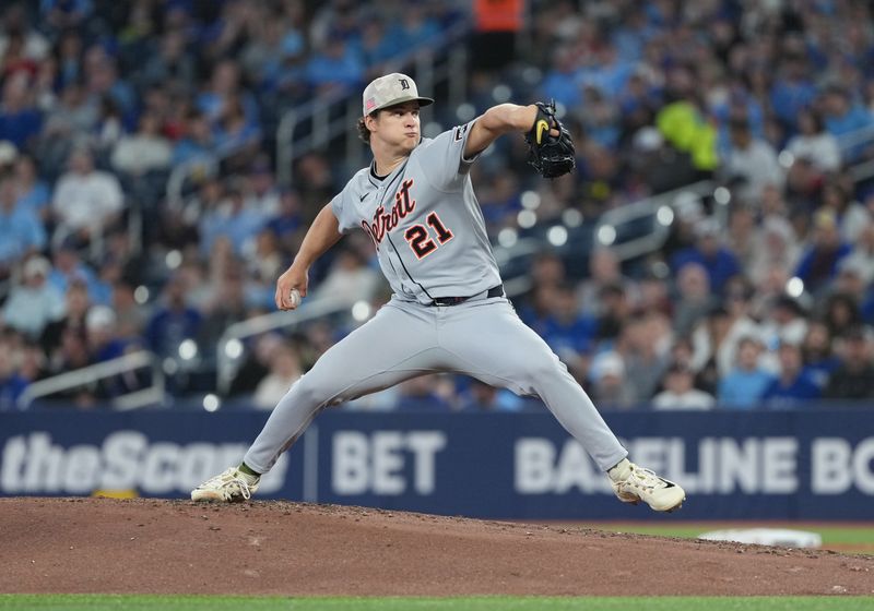 May 18, 2025; Toronto, Ontario, CAN; Detroit Tigers starting pitcher Jackson Jobe (21) throws pitch against the Toronto Blue Jays during the first inning at Rogers Centre. Mandatory Credit: Nick Turchiaro-Imagn Images