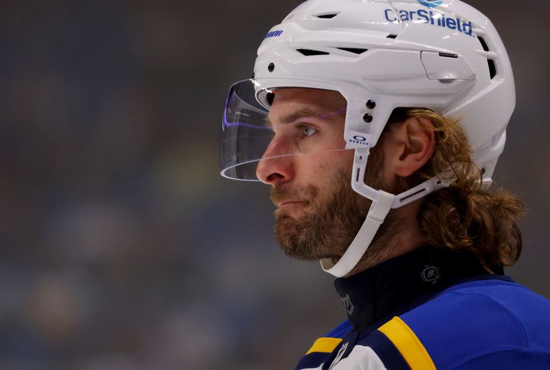 Nov 14, 2024; Buffalo, New York, USA;  St. Louis Blues left wing Brandon Saad (20) waits for the faceoff during the first period against the Buffalo Sabres at KeyBank Center. Mandatory Credit: Timothy T. Ludwig-Imagn Images