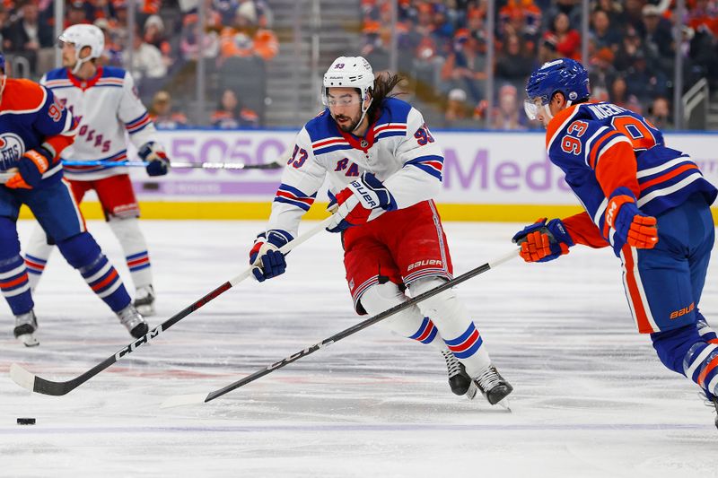 Nov 23, 2024; Edmonton, Alberta, CAN; New York Rangers forward Mika Zibanejad (93) tries to carry the puck around Edmonton Oilers forward Ryan Nugent-Hopkins (93) during the second period at Rogers Place. Mandatory Credit: Perry Nelson-Imagn Images