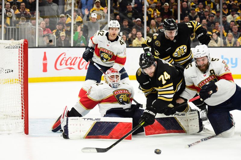 May 17, 2024; Boston, Massachusetts, USA; Boston Bruins left wing Jake DeBrusk (74) and Florida Panthers defenseman Aaron Ekblad (5) battle for the puck in front of goaltender Sergei Bobrovsky (72) during the third period in game six of the second round of the 2024 Stanley Cup Playoffs at TD Garden. Mandatory Credit: Bob DeChiara-USA TODAY Sports