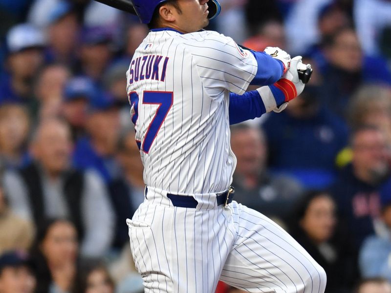 May 27, 2025; Chicago, Illinois, USA; Chicago Cubs designated hitter Seiya Suzuki (27) hits an RBI single during the third inning against the Colorado Rockies at Wrigley Field. Mandatory Credit: Patrick Gorski-Imagn Images
