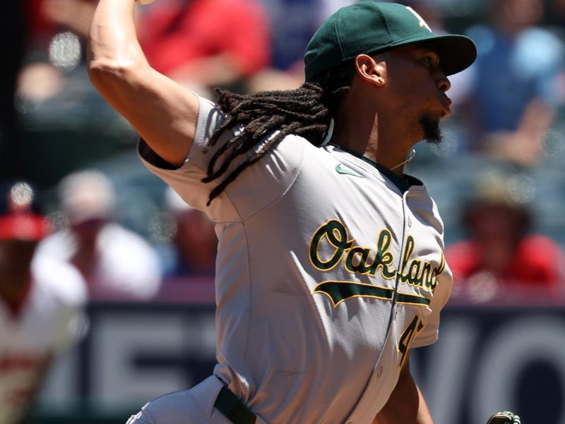 Jul 28, 2024; Anaheim, California, USA;  Oakland Athletics starting pitcher Osvaldo Bido (45) pitches during the first inning against the Los Angeles Angels at Angel Stadium. Mandatory Credit: Kiyoshi Mio-USA TODAY Sports