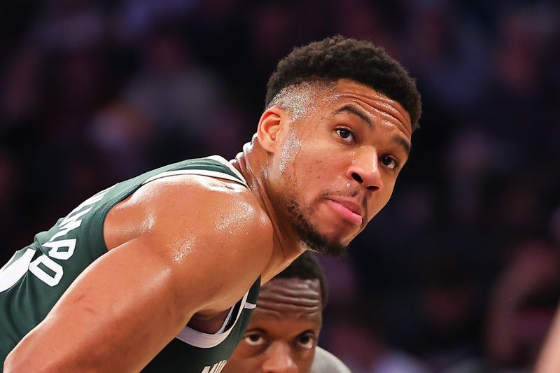 NEW YORK, NEW YORK - DECEMBER 25: Giannis Antetokounmpo #34 of the Milwaukee Bucks talks to a teammate during the first quarter of the game against the New York Knicks at Madison Square Garden on December 25, 2023 in New York City.  NOTE TO USER: User expressly acknowledges and agrees that, by downloading and or using this photograph, User is consenting to the terms and conditions of the Getty Images License Agreement. (Photo by Rich Graessle/Getty Images)