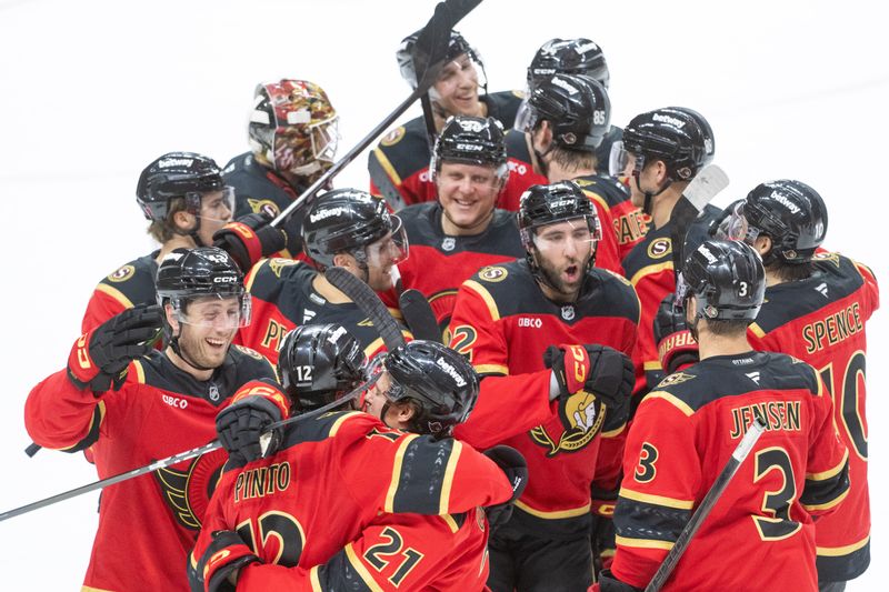 Oct 16, 2025; Ottawa, Ontario, CAN; The Ottawa Senators celebrate their win against the Seattle Kraken in a shootout at the Canadian Tire Centre. Mandatory Credit: Marc DesRosiers-IMAGN Images
