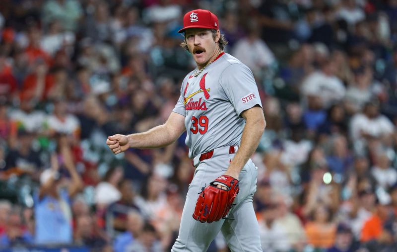 Jun 5, 2024; Houston, Texas, USA; St. Louis Cardinals starting pitcher Miles Mikolas (39) reacts after a play during the fourth inning against the Houston Astros at Minute Maid Park. Mandatory Credit: Troy Taormina-USA TODAY Sports