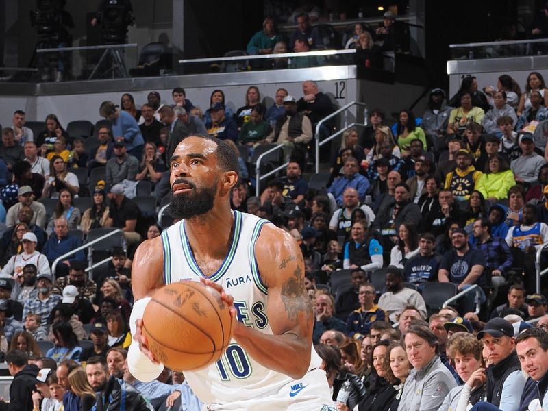 INDIANAPOLIS, IN - MARCH 7: Mike Conley #10 of the Minnesota Timberwolves handles the ball during the game against the Indiana Pacers on March 7, 2024 at Gainbridge Fieldhouse in Indianapolis, Indiana. NOTE TO USER: User expressly acknowledges and agrees that, by downloading and or using this Photograph, user is consenting to the terms and conditions of the Getty Images License Agreement. Mandatory Copyright Notice: Copyright 2024 NBAE (Photo by Ron Hoskins/NBAE via Getty Images)