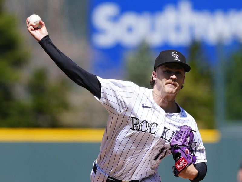 Apr 10, 2025; Denver, Colorado, USA; Colorado Rockies starting pitcher Ryan Feltner (18) delivers a pitch in the first inning against the Milwaukee Brewers at Coors Field. Mandatory Credit: Ron Chenoy-Imagn Images