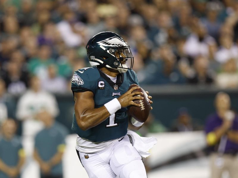 Philadelphia Eagles quarterback Jalen Hurts (1) looks to pass during an NFL football game against the Minnesota Vikings on Monday, September 19, 2022, in Philadelphia. (AP Photo/Matt Patterson)