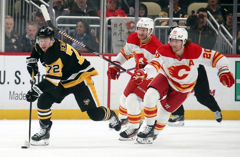 Nov 30, 2024; Pittsburgh, Pennsylvania, USA;  Pittsburgh Penguins left wing Anthony Beauvillier (72) breaks up ice with the puck against the Calgary Flames during the first period at PPG Paints Arena. Mandatory Credit: Charles LeClaire-Imagn Images