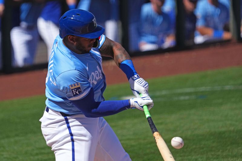 Mar 11, 2024; Surprise, Arizona, USA; Kansas City Royals right fielder Nelson Velazquez (17) bats against the San Francisco Giants during the first inning at Surprise Stadium. Mandatory Credit: Joe Camporeale-USA TODAY Sports