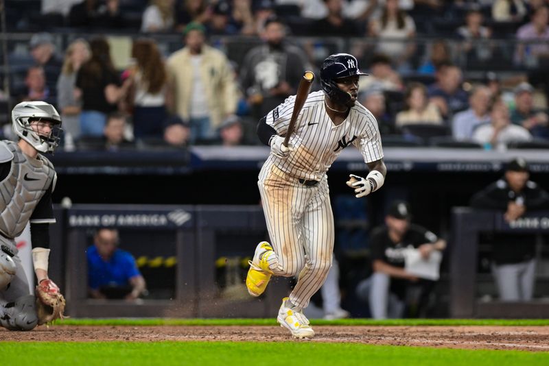 Sep 23, 2025; Bronx, New York, USA; New York Yankees second baseman Jazz Chisholm Jr. (13) hits a single against the Chicago White Sox during the sixth inning at Yankee Stadium. Mandatory Credit: John Jones-Imagn Images