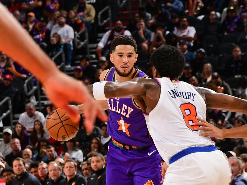 PHOENIX, AZ - NOVEMBER 20: Devin Booker #1 of the Phoenix Suns dribbles the ball during the game against the New York Knicks on November 20, 2024 at Footprint Center in Phoenix, Arizona. NOTE TO USER: User expressly acknowledges and agrees that, by downloading and or using this photograph, user is consenting to the terms and conditions of the Getty Images License Agreement. Mandatory Copyright Notice: Copyright 2024 NBAE (Photo by Kate Frese/NBAE via Getty Images)